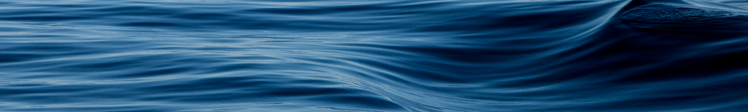 Close-up of blue ocean water with gentle waves