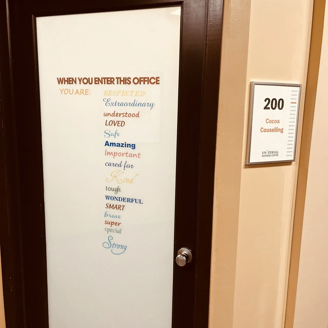 The office door with welcoming affirmations.