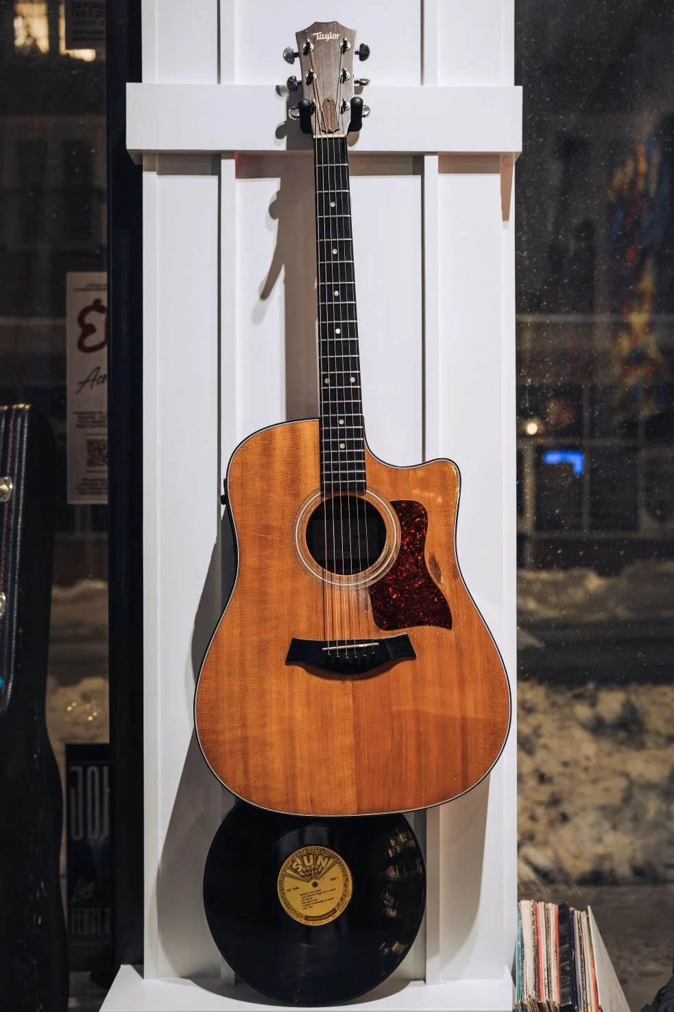 Shot showing Taylor guitar represented at LoCali