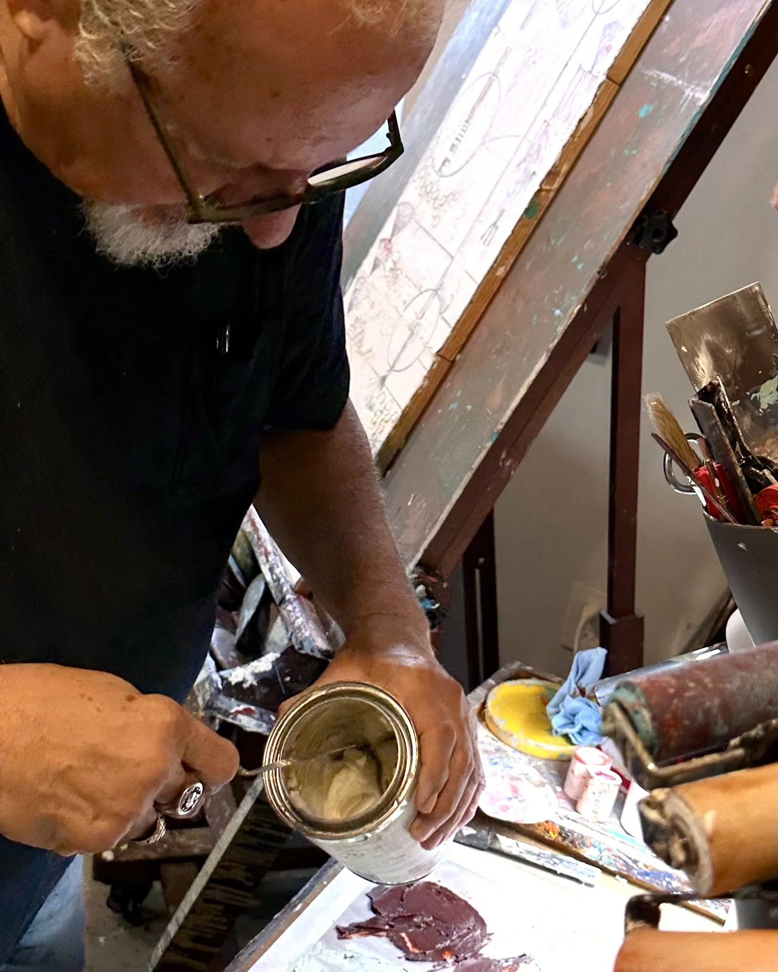 west chester artist anthony zecca working on a painting