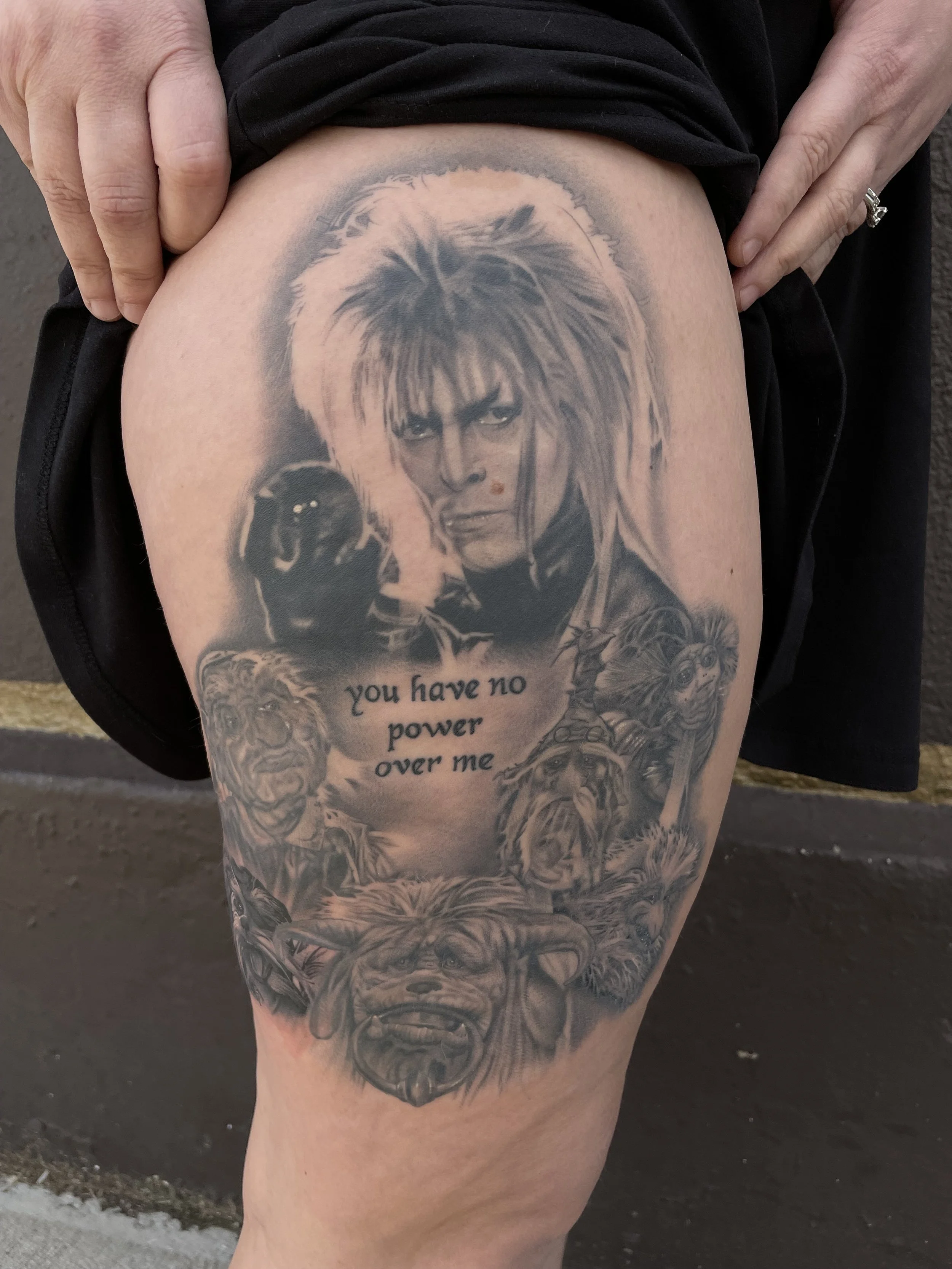 Tattoos of characters from the movie Labyrinth, including Jareth the Goblin King and other fantasy characters, with the phrase "you have no power over me".