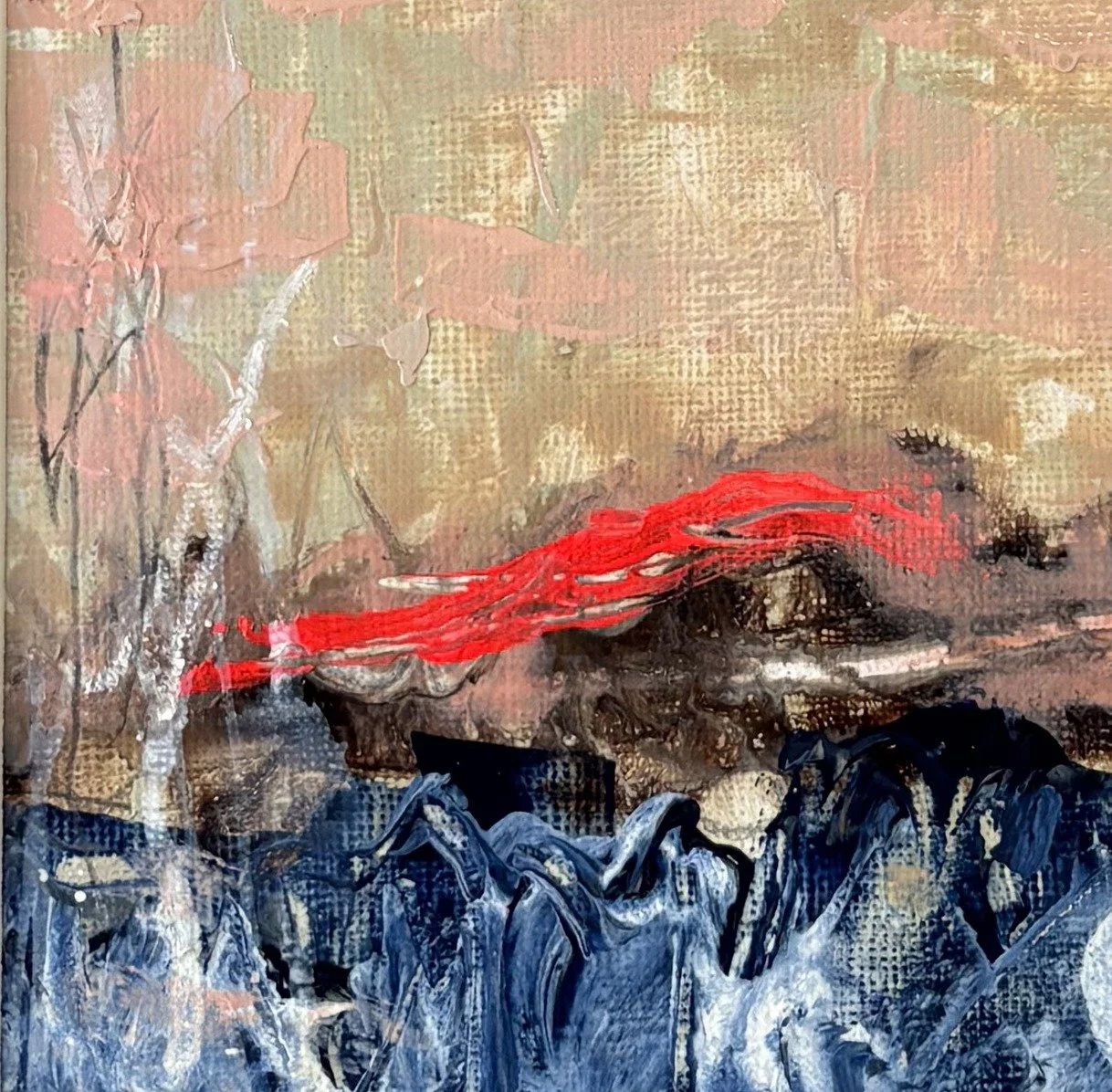 Abstract seascape with a dusty pink sky, dark blue sea and a neon red streak on the horizon