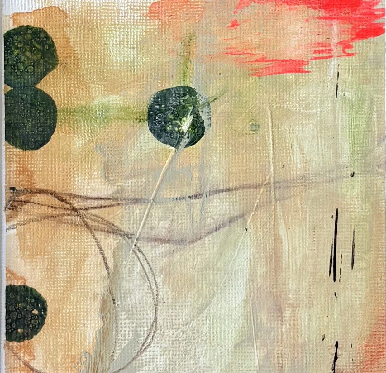 Abstract painting in sand and sage with dark green circles and a smudge of neon coral