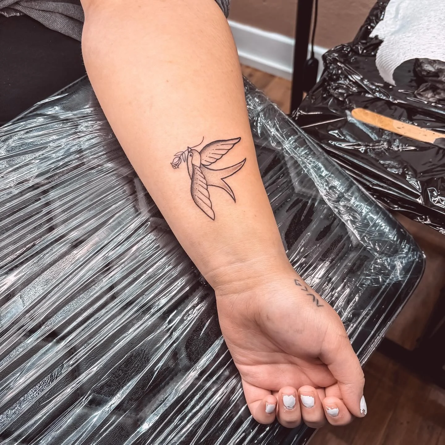 Custom little sparrow with a rose tattoo to remember a grandmother and grandfather. Inspired by American traditional style with a hint of @nwartsrecreation
