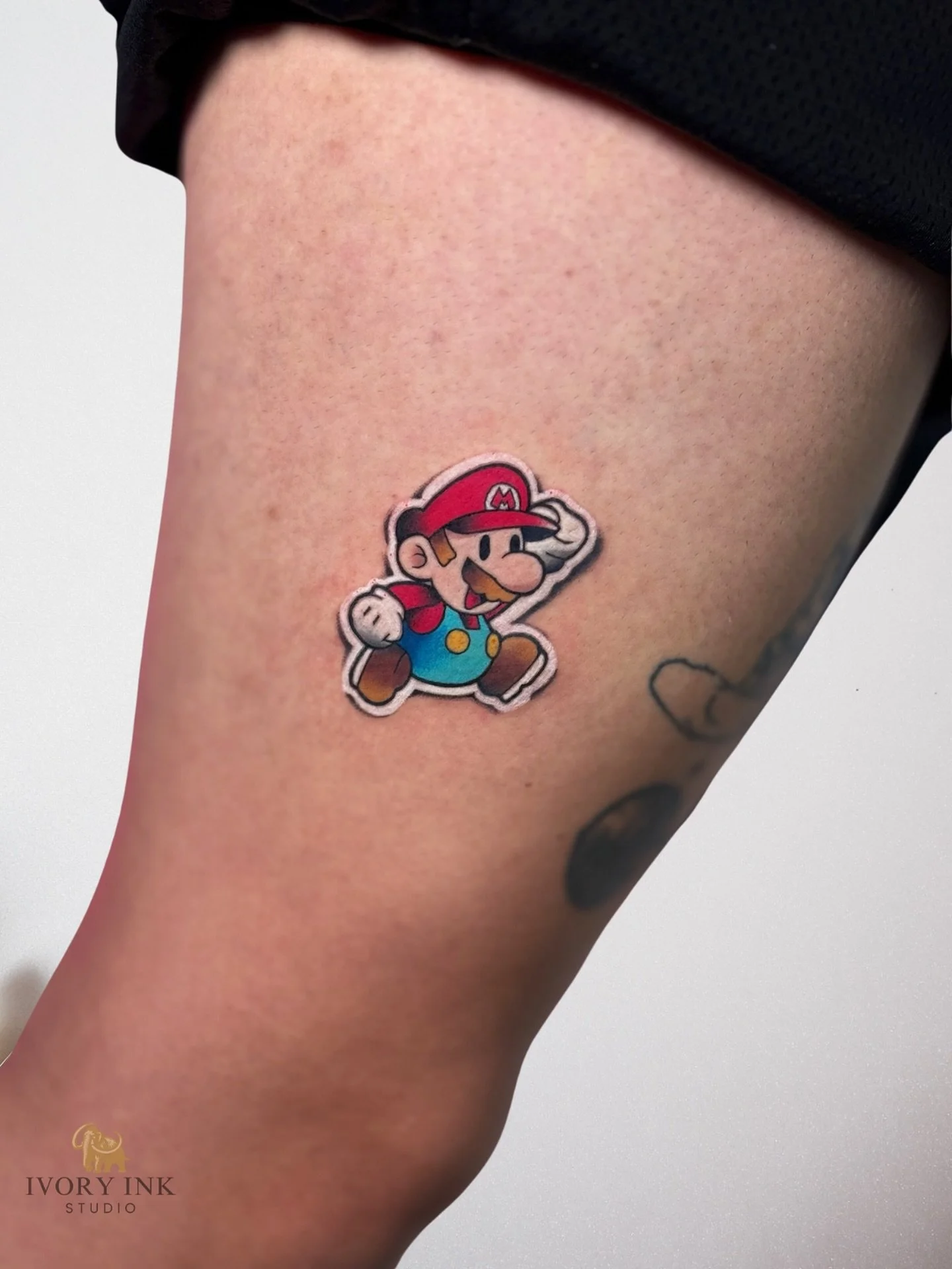 Looks like a sticker... but it&rsquo;s all ink ✨

This Mario Bros tattoo was done in the sticker-style technique - bold lines, soft shadows, and a 3D effect that tricks the eye 🎮

DM for a quote 💌
&bull;
&bull;
&bull;
#stickertattoo #supermariobros