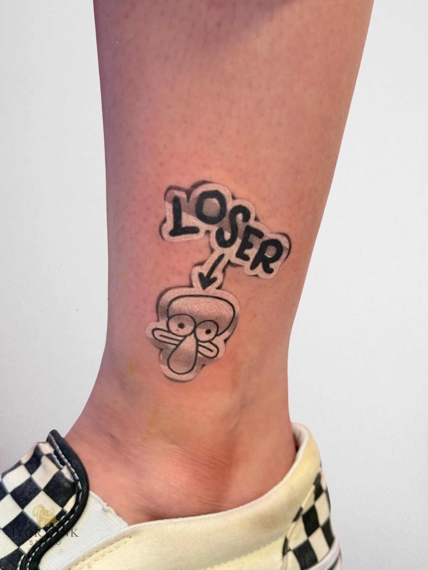 Squidward Q. Tentacles. 🦑 
&bull;
&bull;
&bull;
#spongebobtattoos #stickerstattoo #squidwardtattoo
#stickertattoo #spongebobstickertatttoo
#orlandotattooartist #kissimmeetattoo #tattookissimmee
#tattooorlando #kissimmeetattoo #orlandotattoo