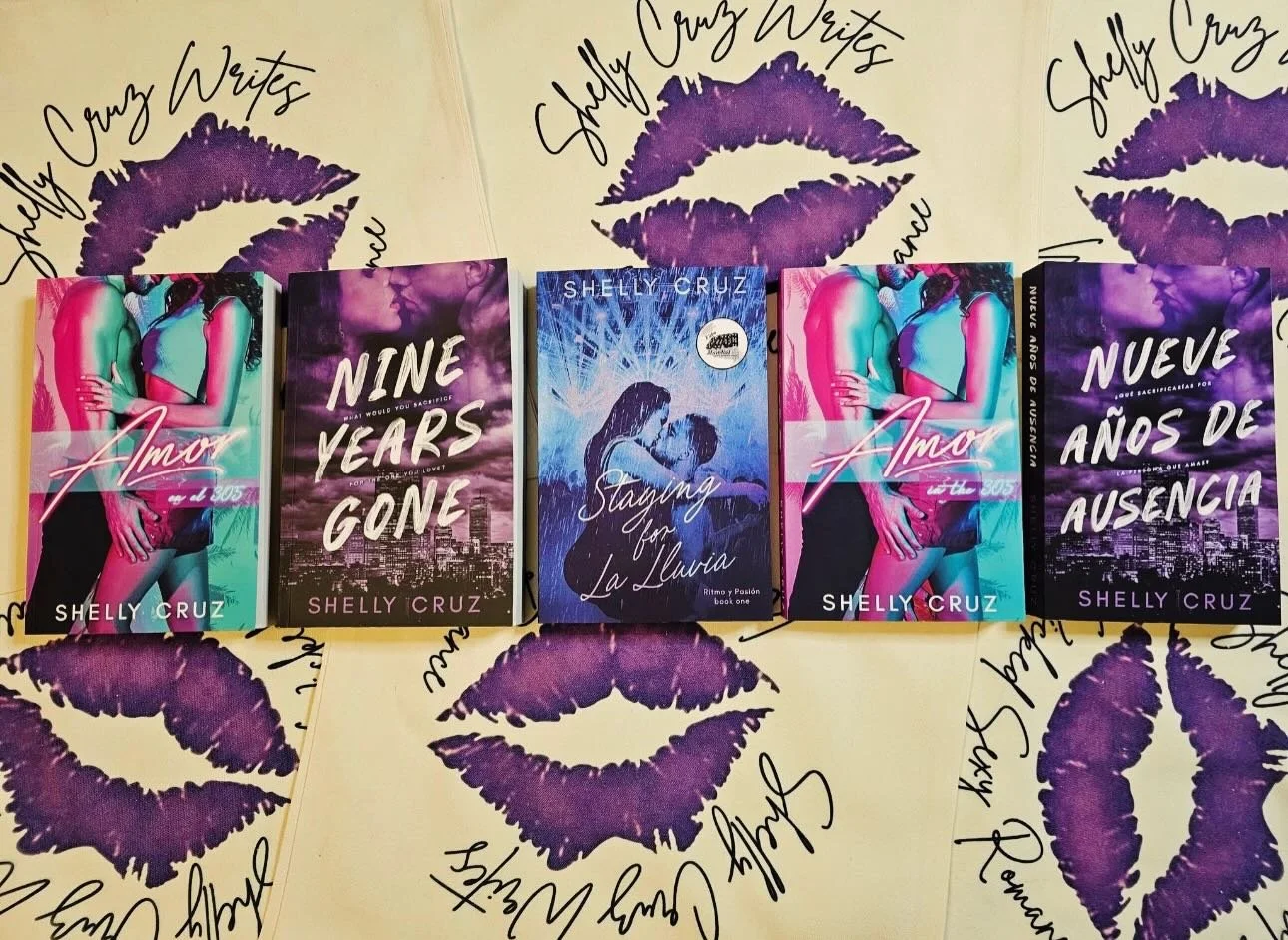 Seeing these all together feels a little surreal.
Nine Years Gone &mdash; in English &amp; Spanish Amor in the 305 &mdash; in English and Spanish Staying for La Lluvia &mdash; my newest release

Stories about love, second chances, family, culture, an