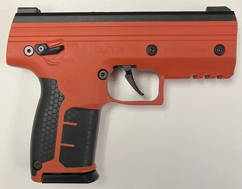 Byrna SD Launcher, less than lethal protection, kit includes two Co2 cylinders, two 5 round magazines and 15 various rounds of ammunition . Pepper and Max rounds in stock. Comes in Orange, Pink, Tan and Black(not recommended by us). $340.