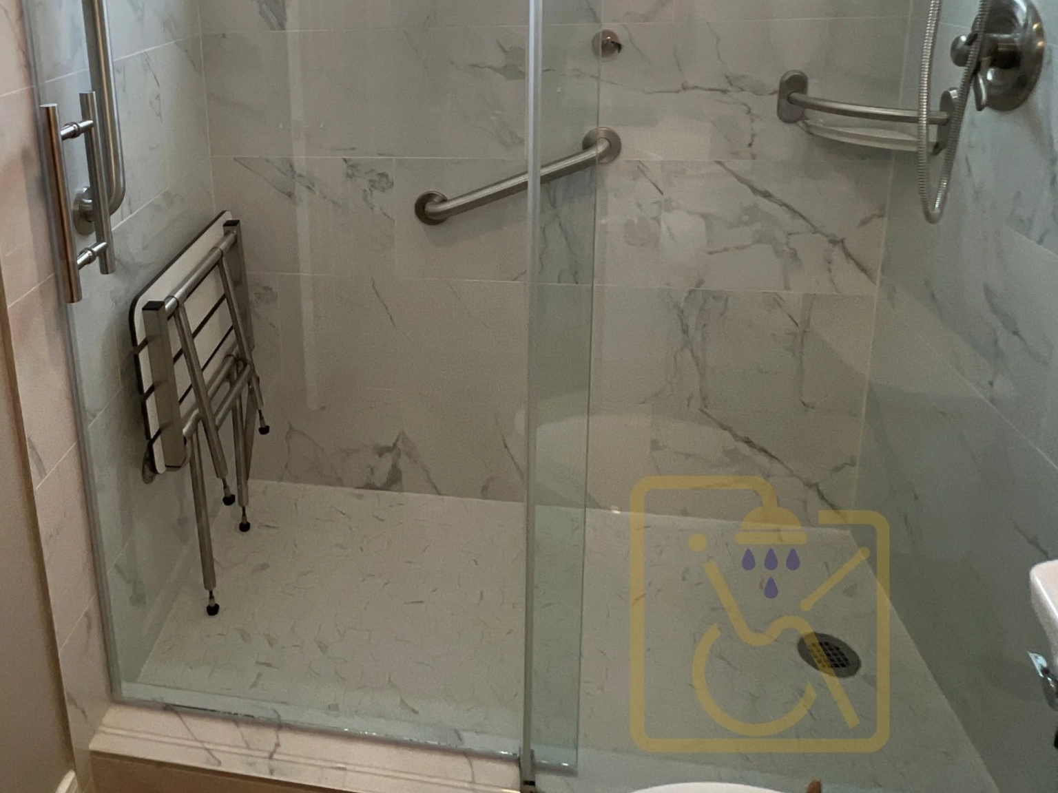 This shower tile floor has been treated  to make it anti-slip