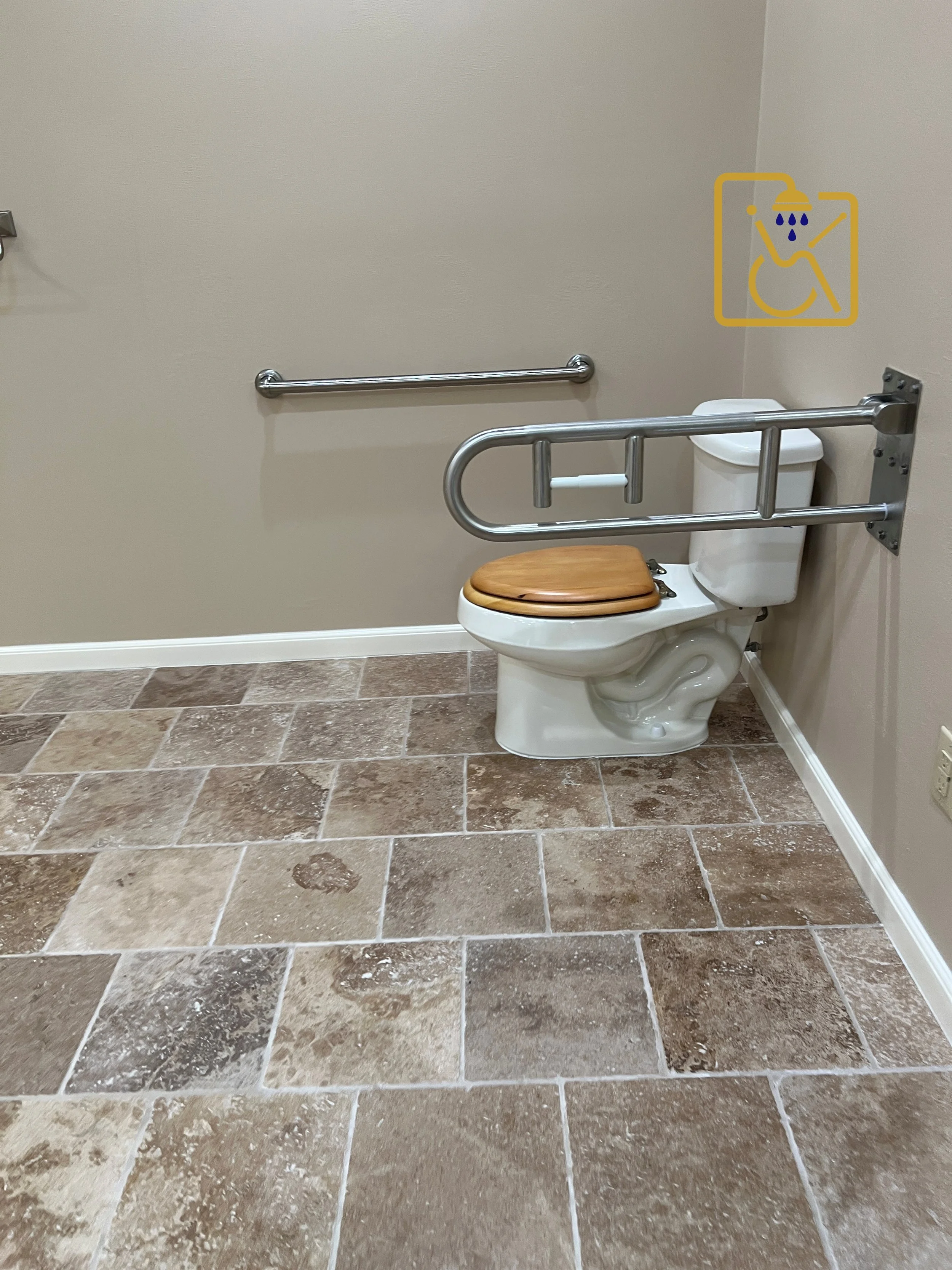 installation of a horizontal grab bar for support and a fold-down grab bar for additional support when the wall is absent.