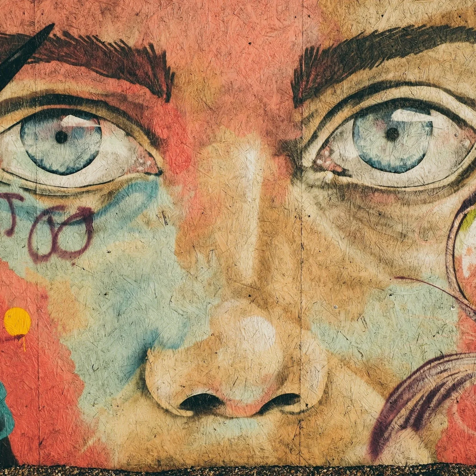 Geometric drawing of an outline square with sections divided by vertical, horizontal, and diagonal lines.