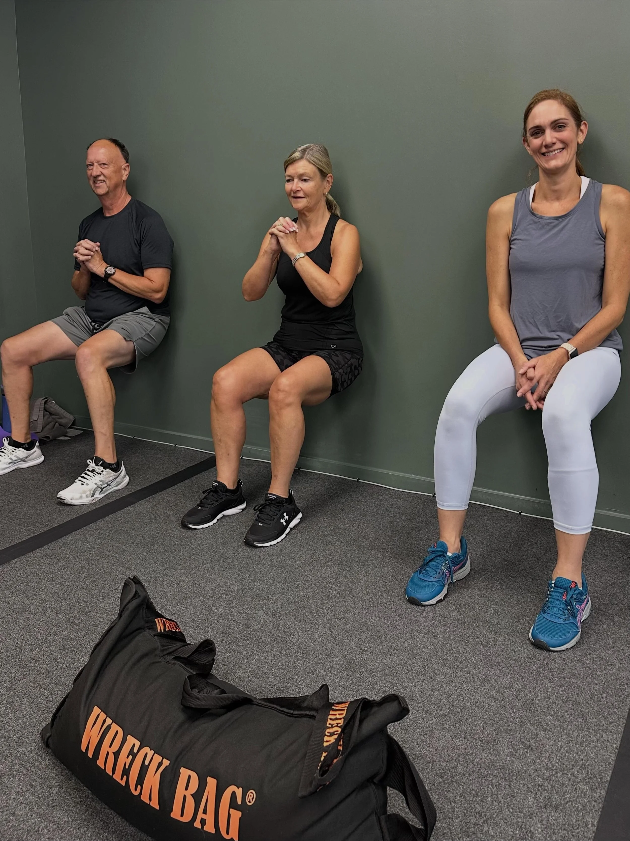 Your muscles don&rsquo;t just need to be strong. They need to be able to KEEP GOING.
That&rsquo;s muscular endurance.
Think about a wall sit.
Your muscles are under tension.
And the longer you hold it, the harder they have to work to maintain that po