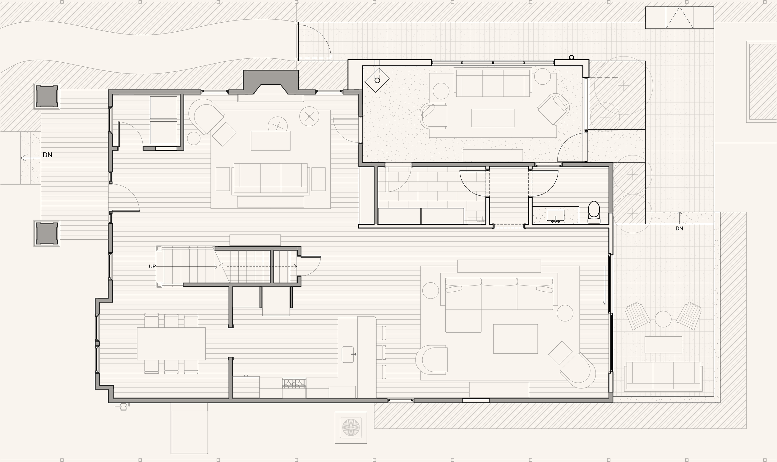 A detailed architectural floor plan of a house, showing various rooms, furniture arrangements, and outdoor areas.