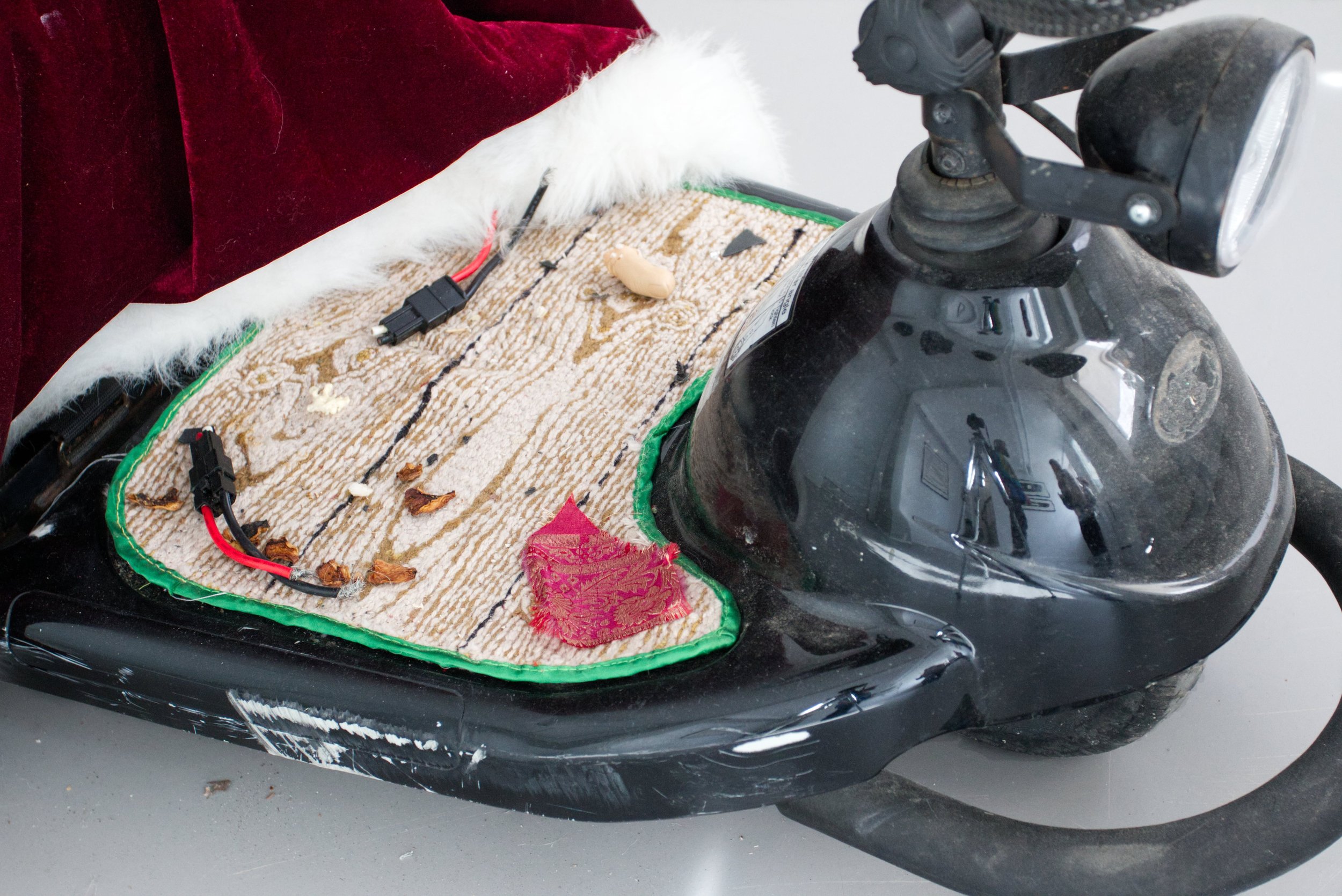 Work Life, robot made from found materials and grinding machine, with hand embroidered mat, 220*150*120 cm, 2025