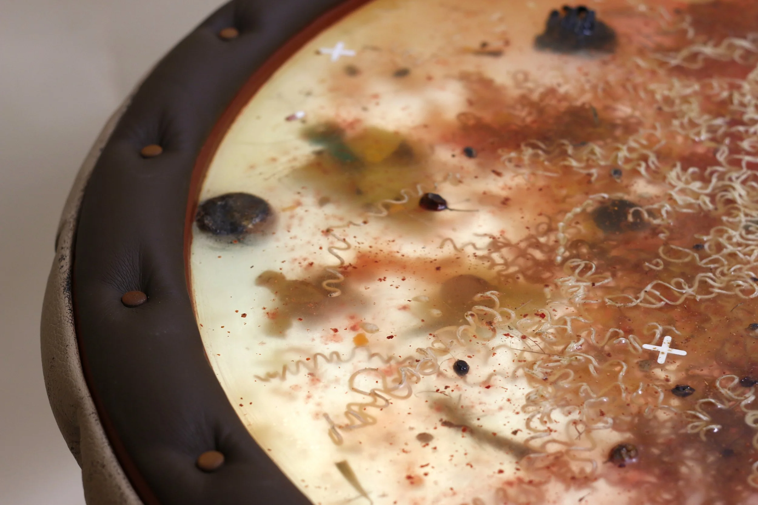 Skeleton (2023)
Sculpture, 100*85*85 cm
Table base, epoxy, cup noodles, underglazed tiles with Jimi Hendrix motif, leather, paint, artificial leather, citrus fruits from the Acropolis, marble from Sicily, found pills from Copenhagen, liberty caps, to