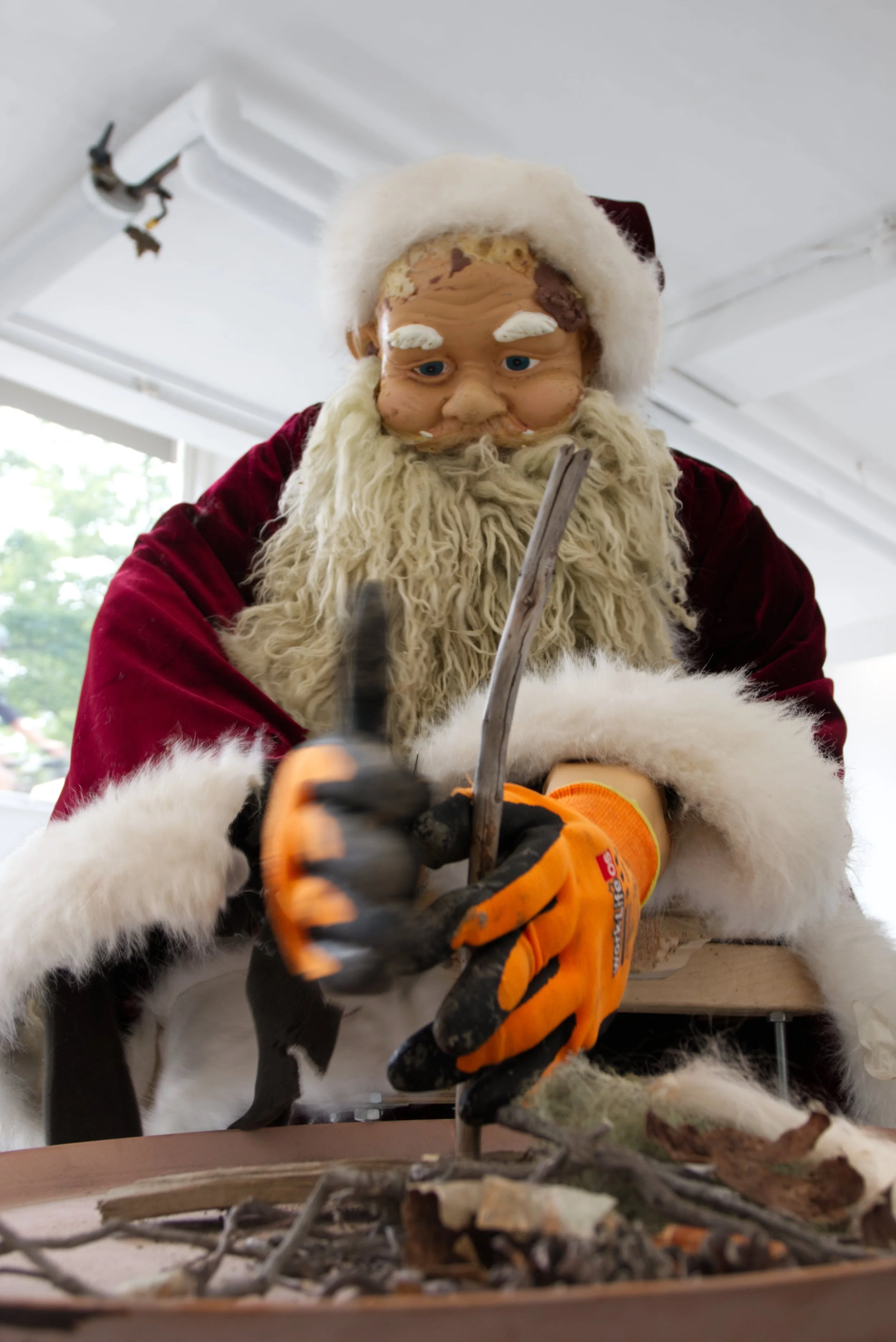 Work Life, robot made from found materials and grinding machine, with hand embroidered mat, 220*150*120 cm, 2025