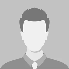 Silhouette of a man wearing a collared shirt and tie