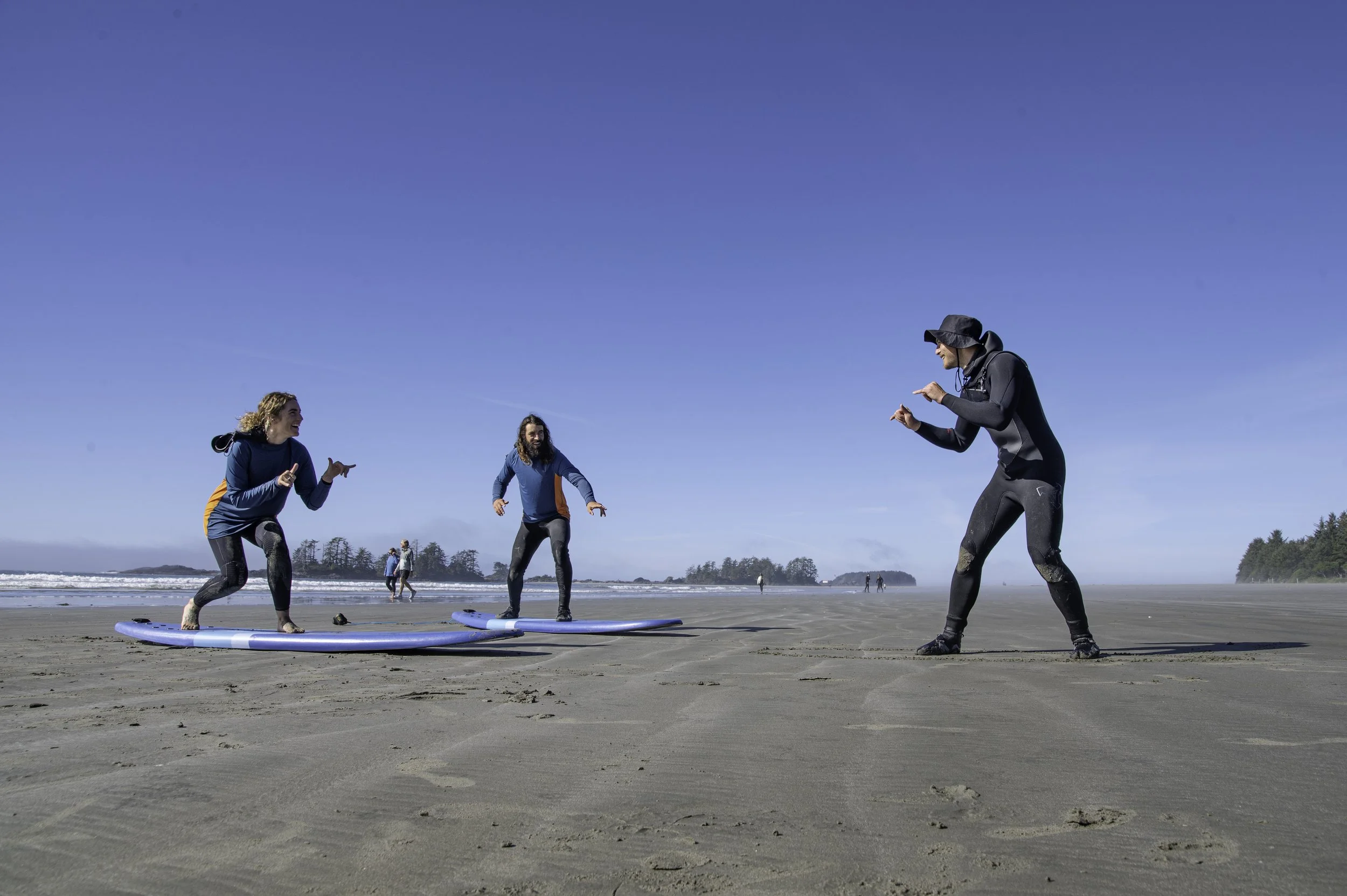 Beginner group in a surf lesson in tofino