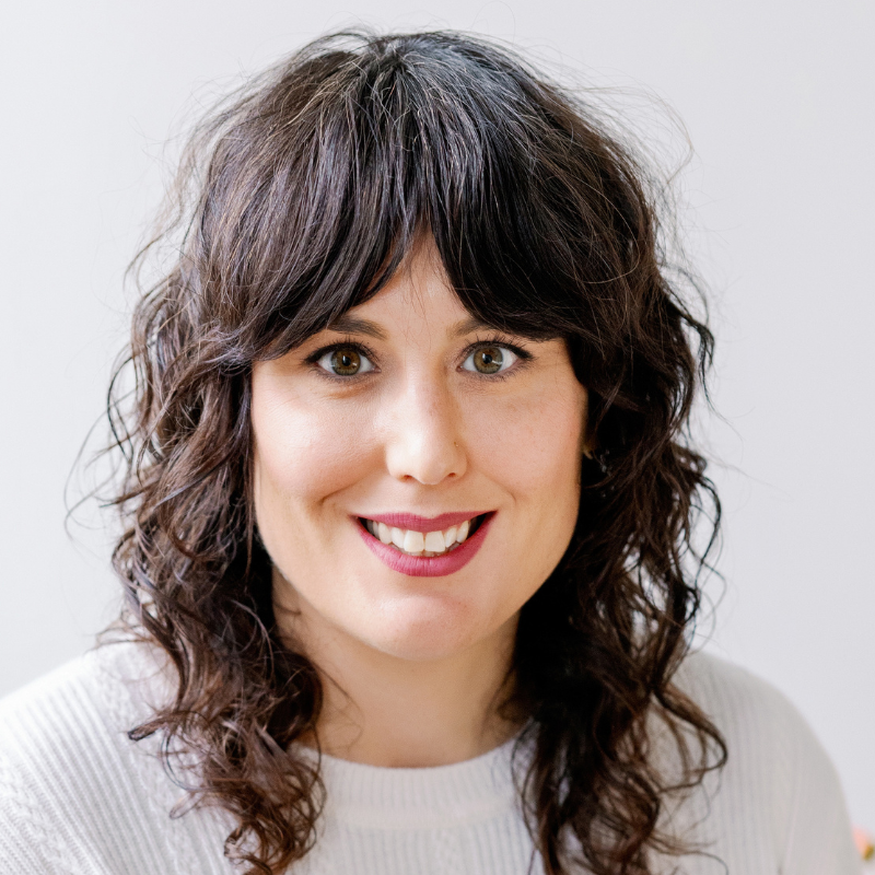 Headshot of Sara Wachter-Boettcher, a white woman with dark wavy hair wearing a white top.