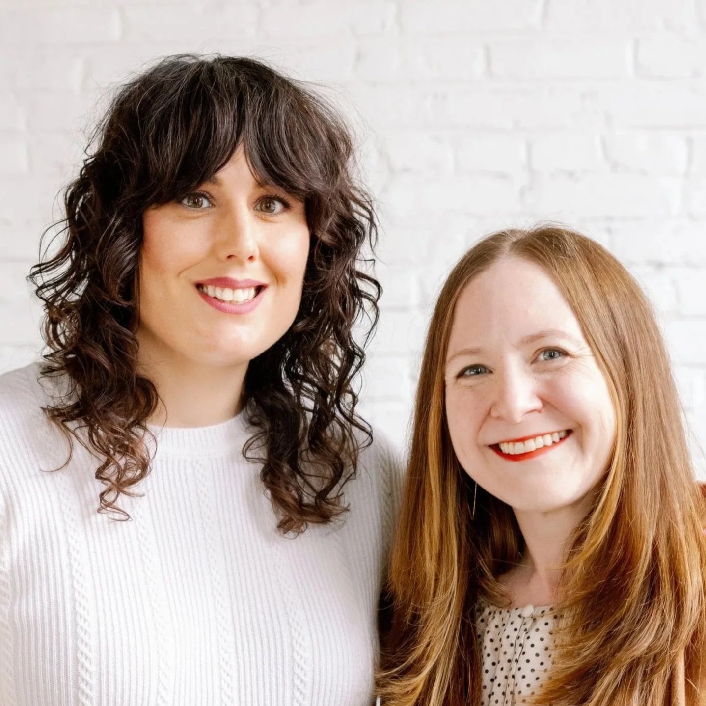 Sara Wachter-Boettcher and Jen Dionisio standing side by side. They are two white women, one tall with dark hair and one shorter with blond hair.