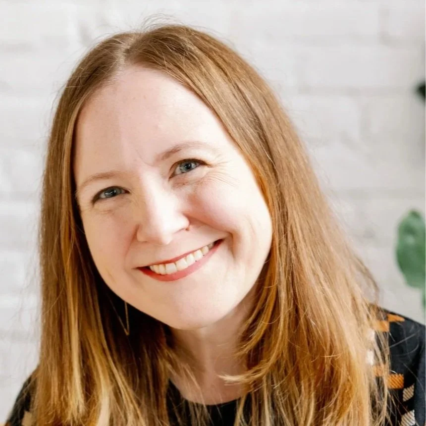 Headshot of Jen Dionisio, a blond woman smiling.