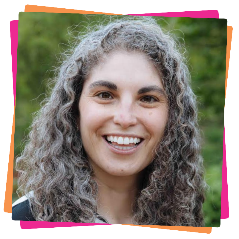 Headshot of Tali Dolsten-Kuhel. They have grey curly hair and smile.