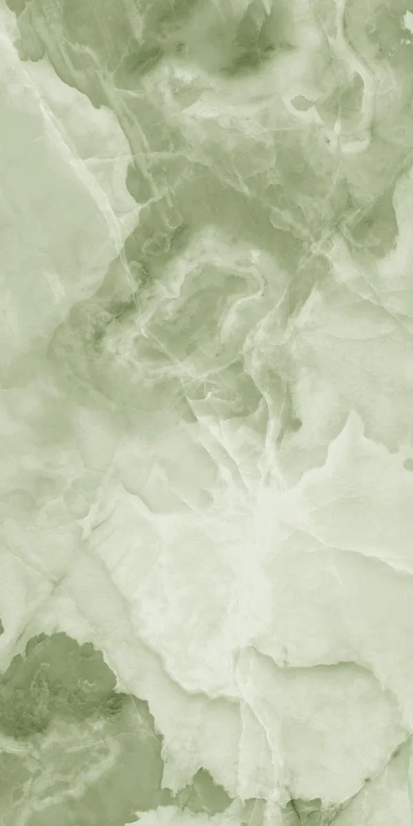 Close-up of green and white marbled stone surface.