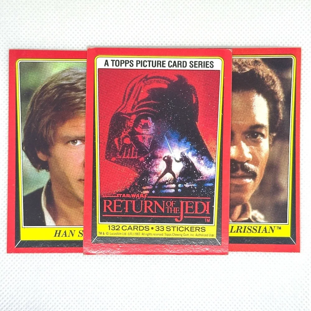 Star Wars Return of the Jedi trading card pack with images of Han Solo, Luke Skywalker, and Darth Vader.