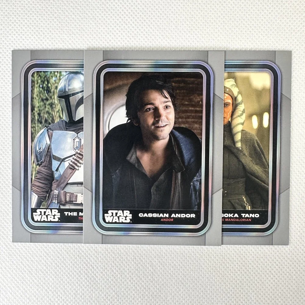 Star Wars trading cards featuring characters including Mandalorian, Cobb Vanth, and Cassian Andor.