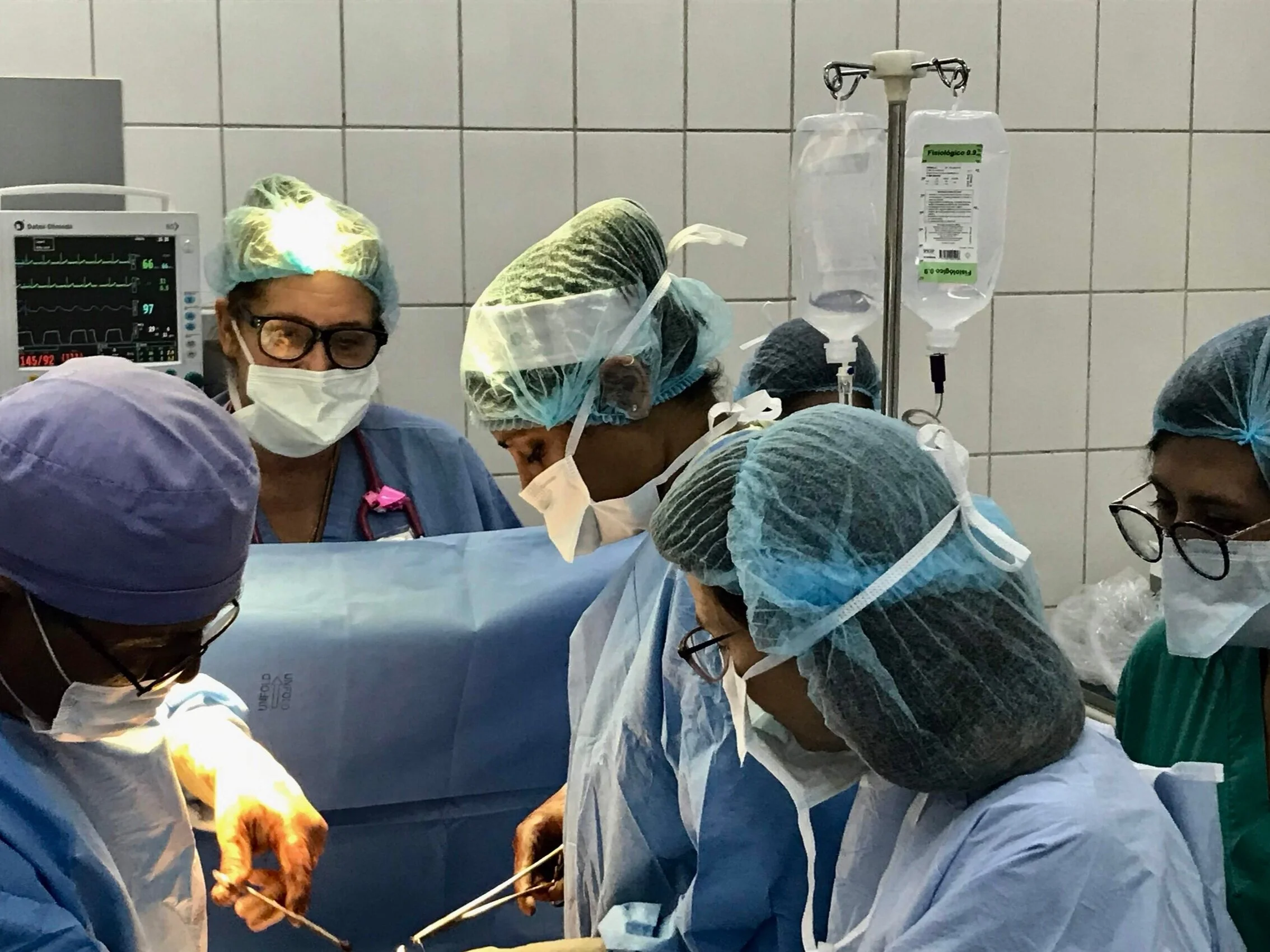  Operating with her Bolivian colleagues 