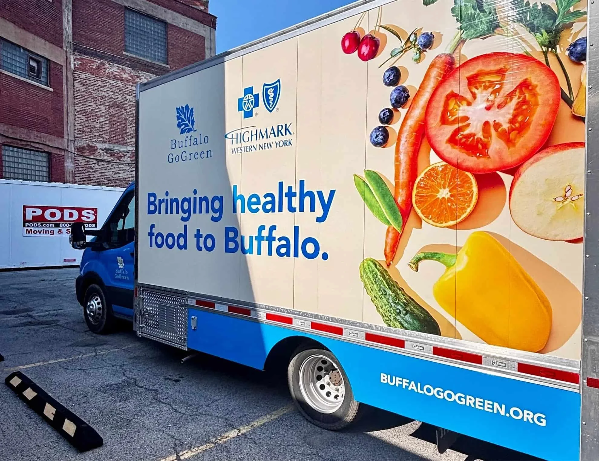 A Buffalo Go Green truck parked