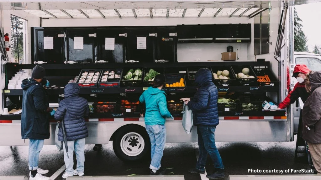 Community members shopping from a mobile market truck