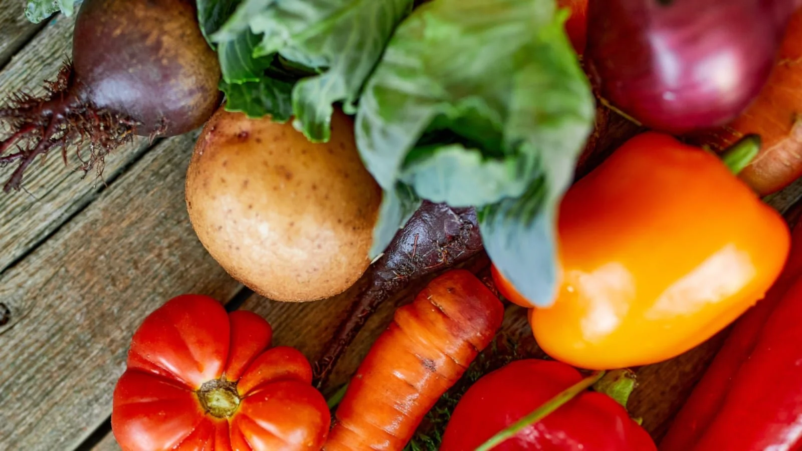 Fruits and veggies sitting on a table
