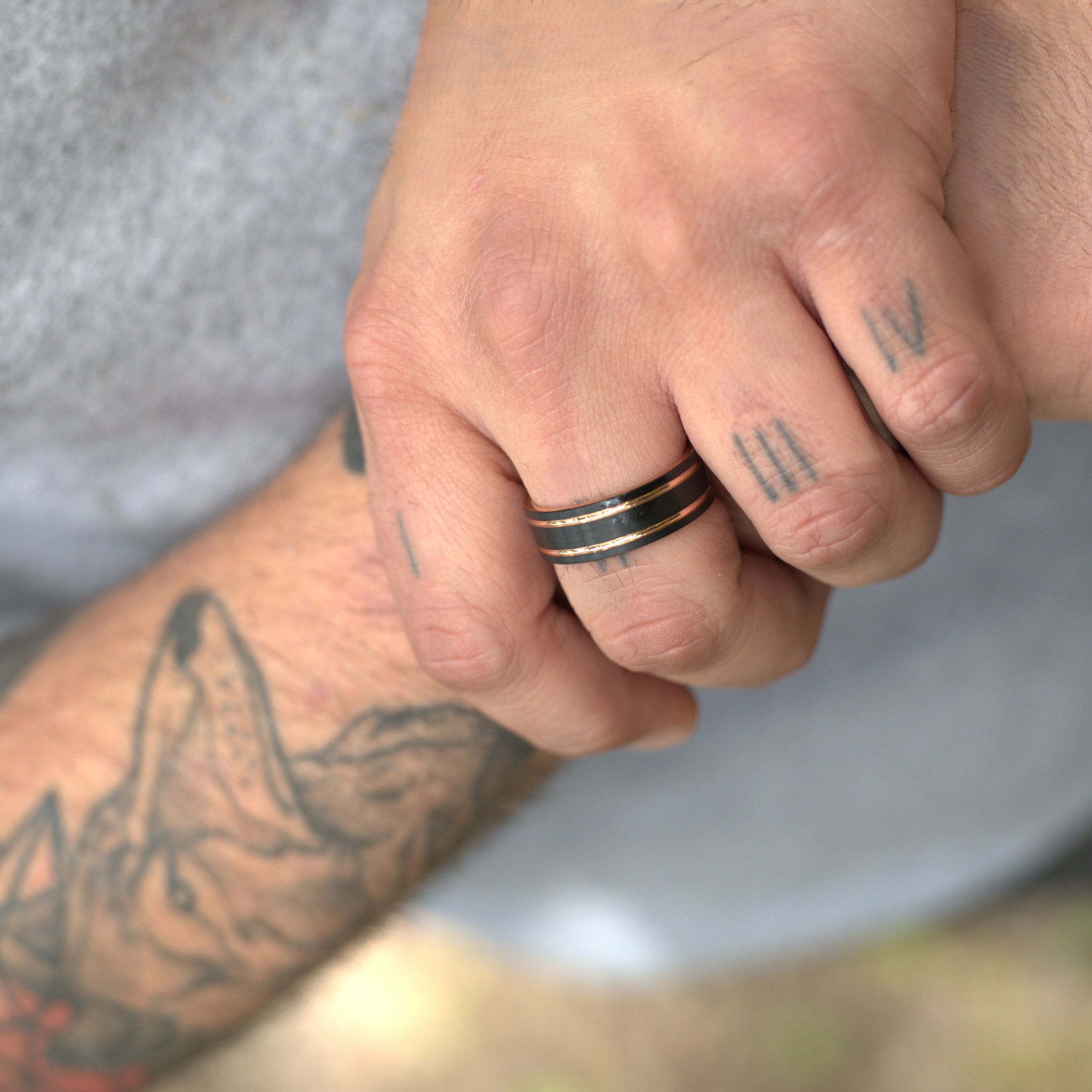 mcqueen-black-and-rose-tungsten-ring-legion-of-none-lifestyle-tattooed-hand.jpg.jpeg