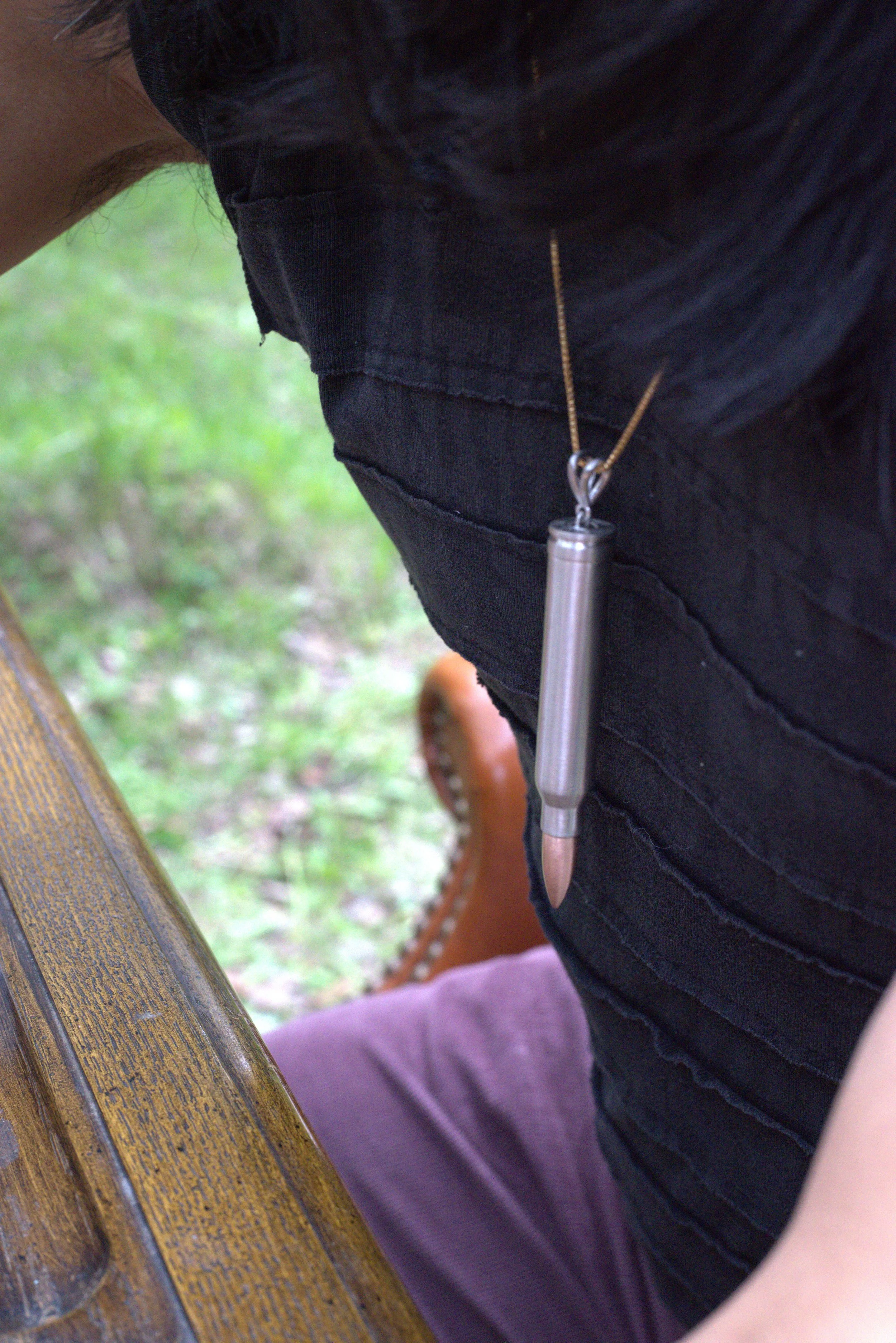 .300-win-mag-silver-bullet-pendant-on-neck-angle-legion-of-none.jpg.jpeg