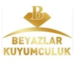 Altın renkli yazıyla 'Beyazlar Kuyumculuk' ve üstte altın rengi bir mücevher simgesi bulunan logo.