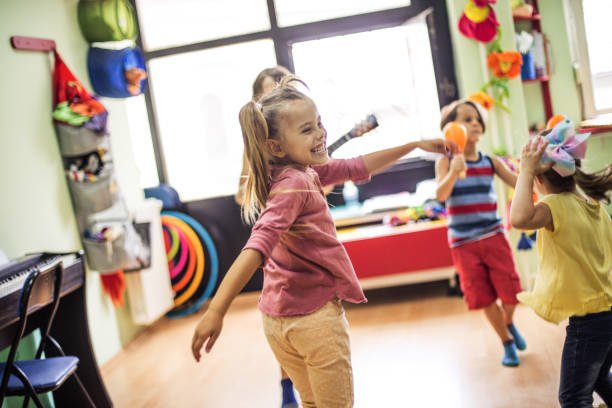 girl smiling and dancing