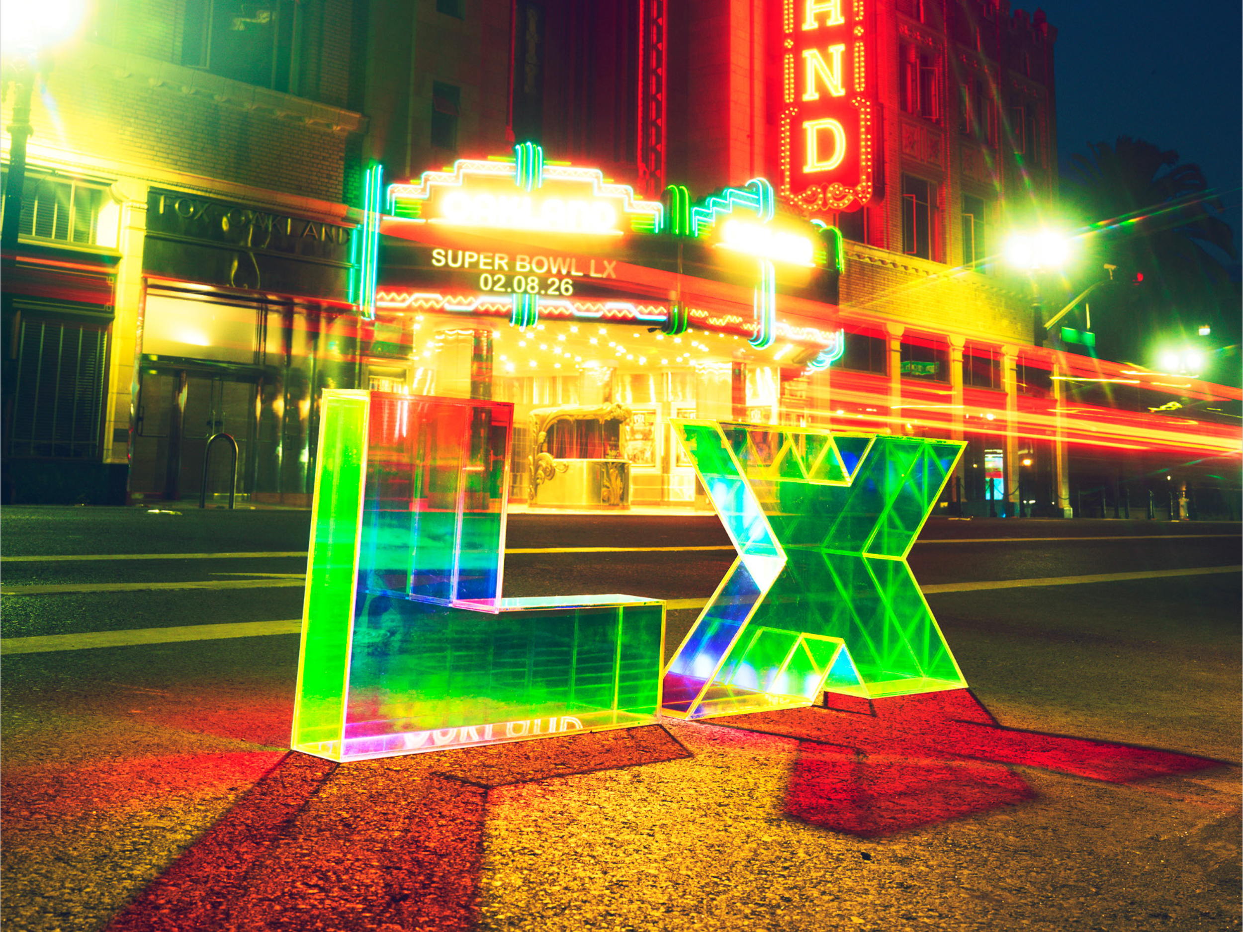 Super Bowl LX logo transparent render in front of Fox Oakland Theate