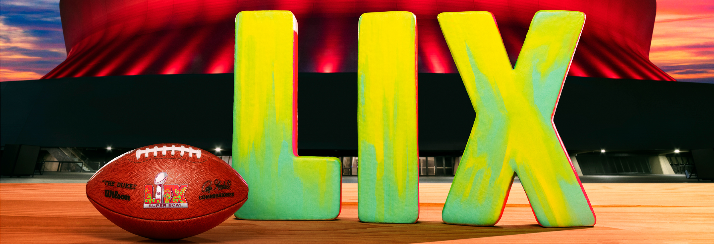 Super Bowl LIX football in front of New Orleans stadium