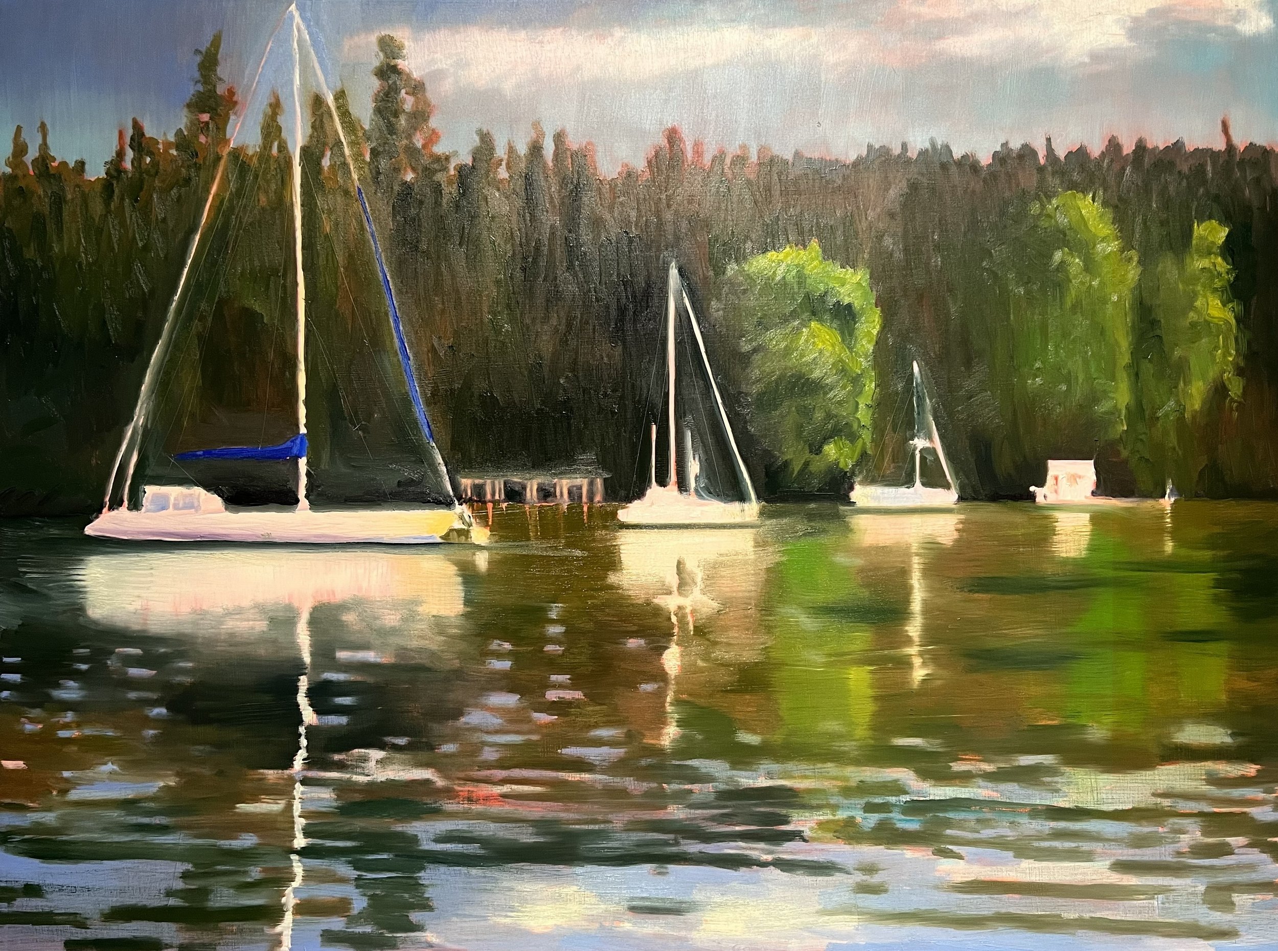 A painting of sailboats on a calm lake with a forested shoreline in the background, reflecting on the water surface at sunset.