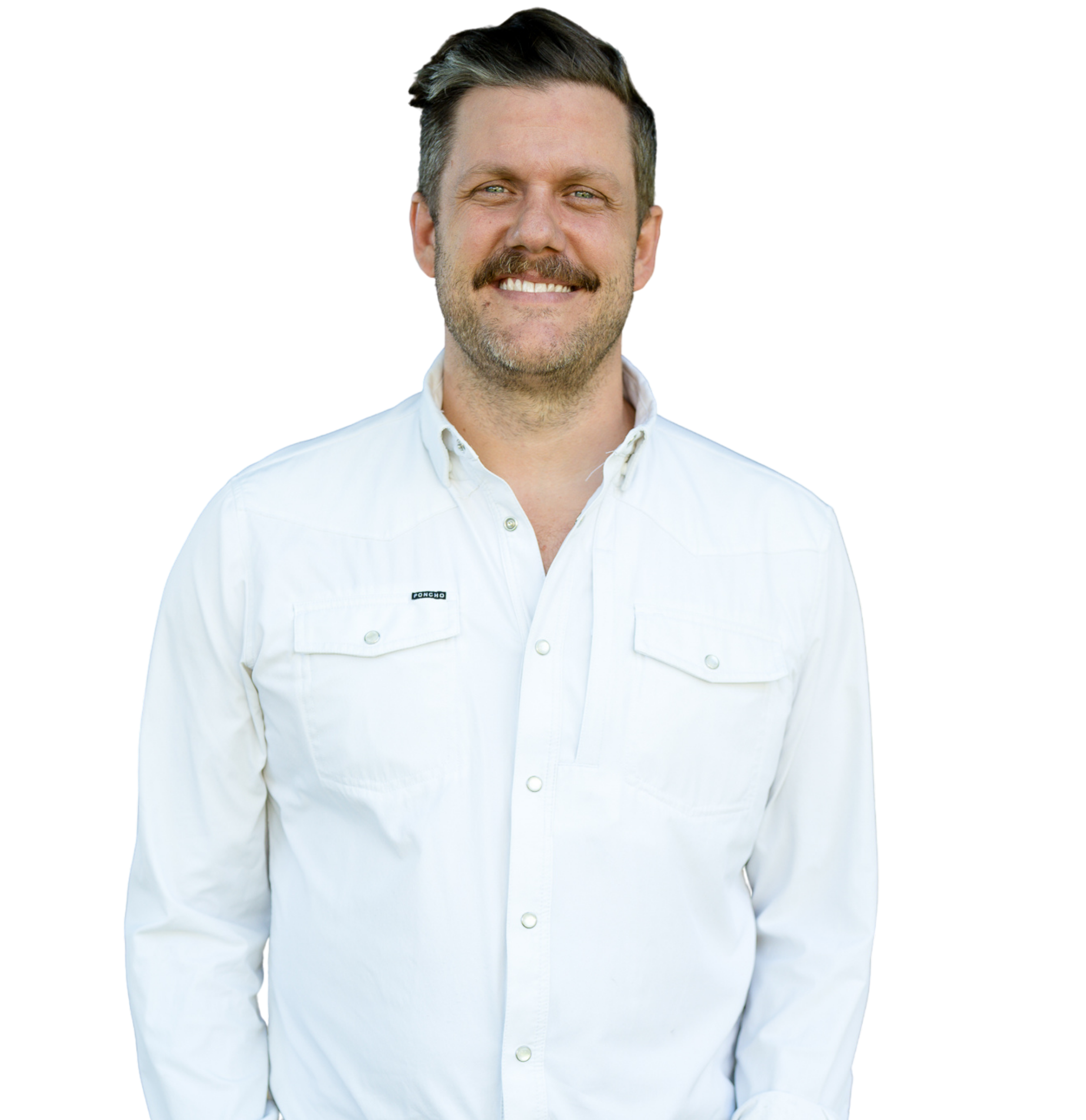 Portrait of Cody Culberson, REALTOR® with League Real Estate, standing outdoors in Fort Worth, Texas.