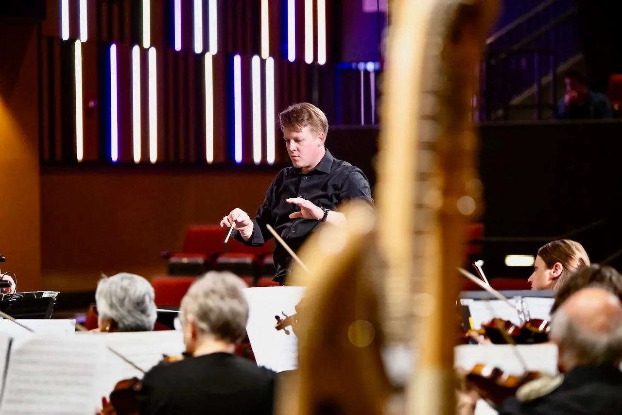 Nickolas Carlson gives speech at 'Revolution' concert