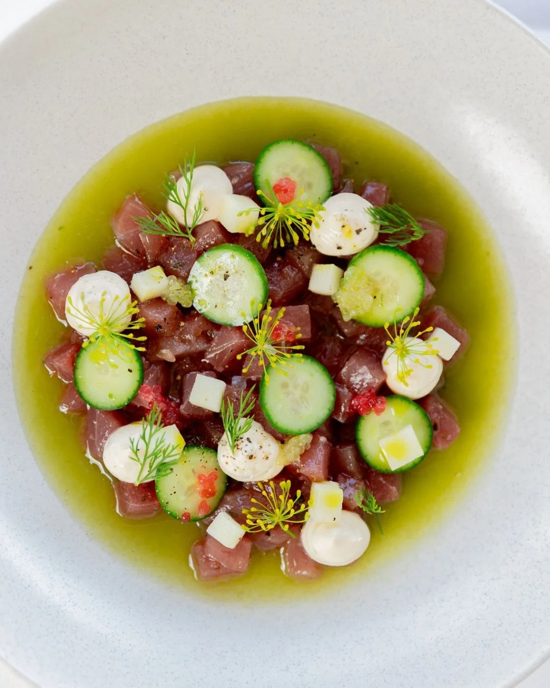 Yellowfin tuna with cucumber, green apple, cr&egrave;me fra&icirc;che and finger lime.

Clean, crisp and made for warm days by the water, a dish that lets every ingredient shine.

Join us for lunch or dinner.