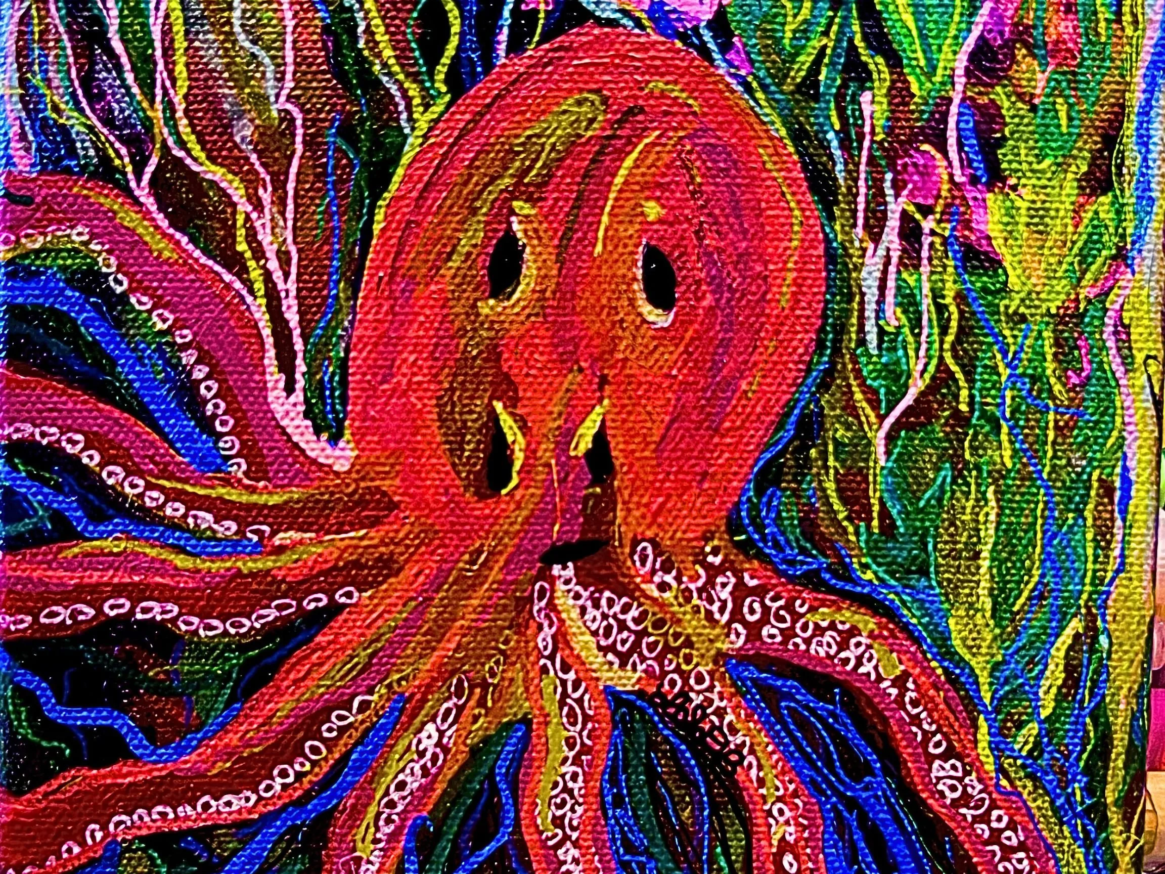 Colorful abstract painting with vibrant red, pink, yellow, blue, green, and black swirling patterns and dotted accents.