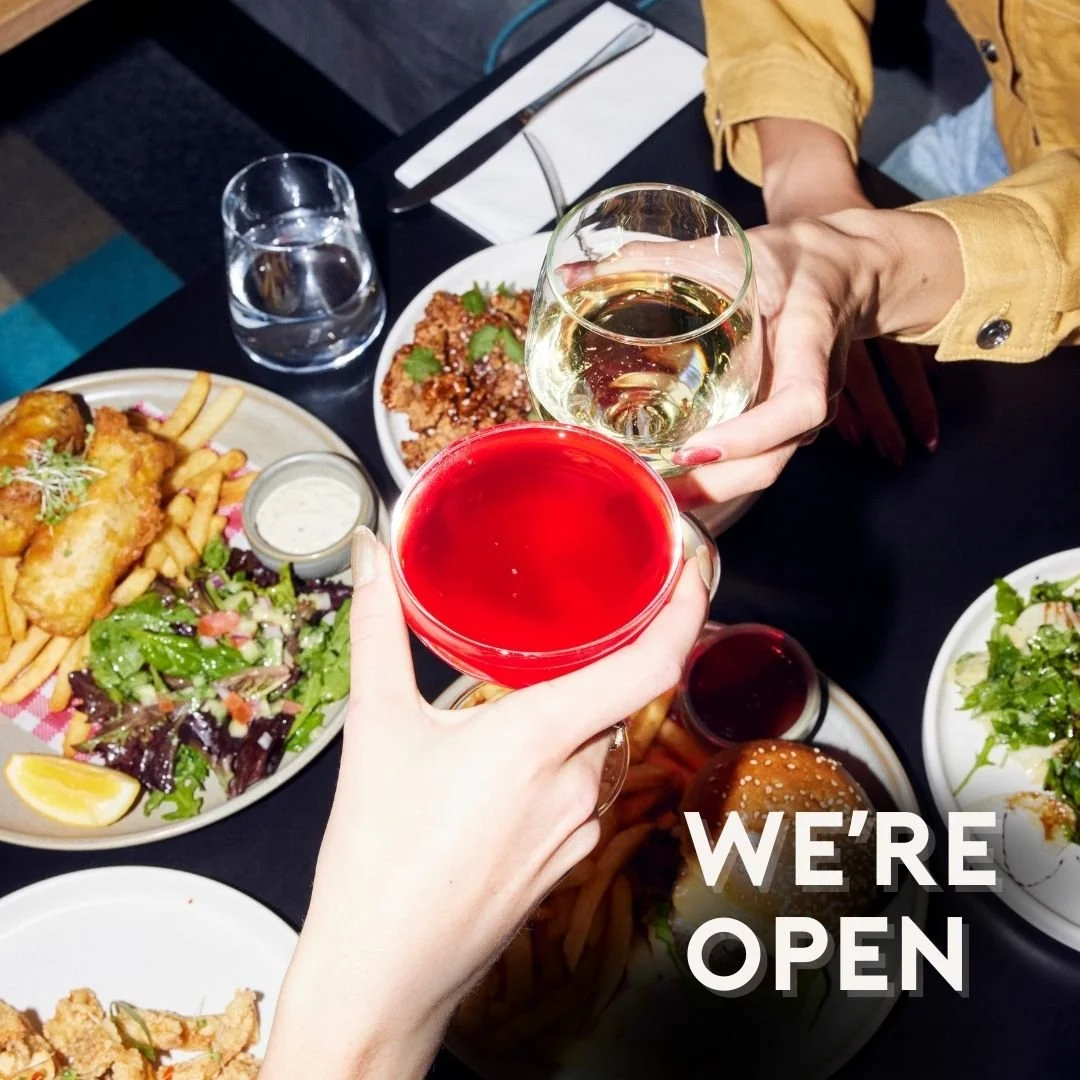 2 hands clinking beverages at Frankie's with text stating We're Open
