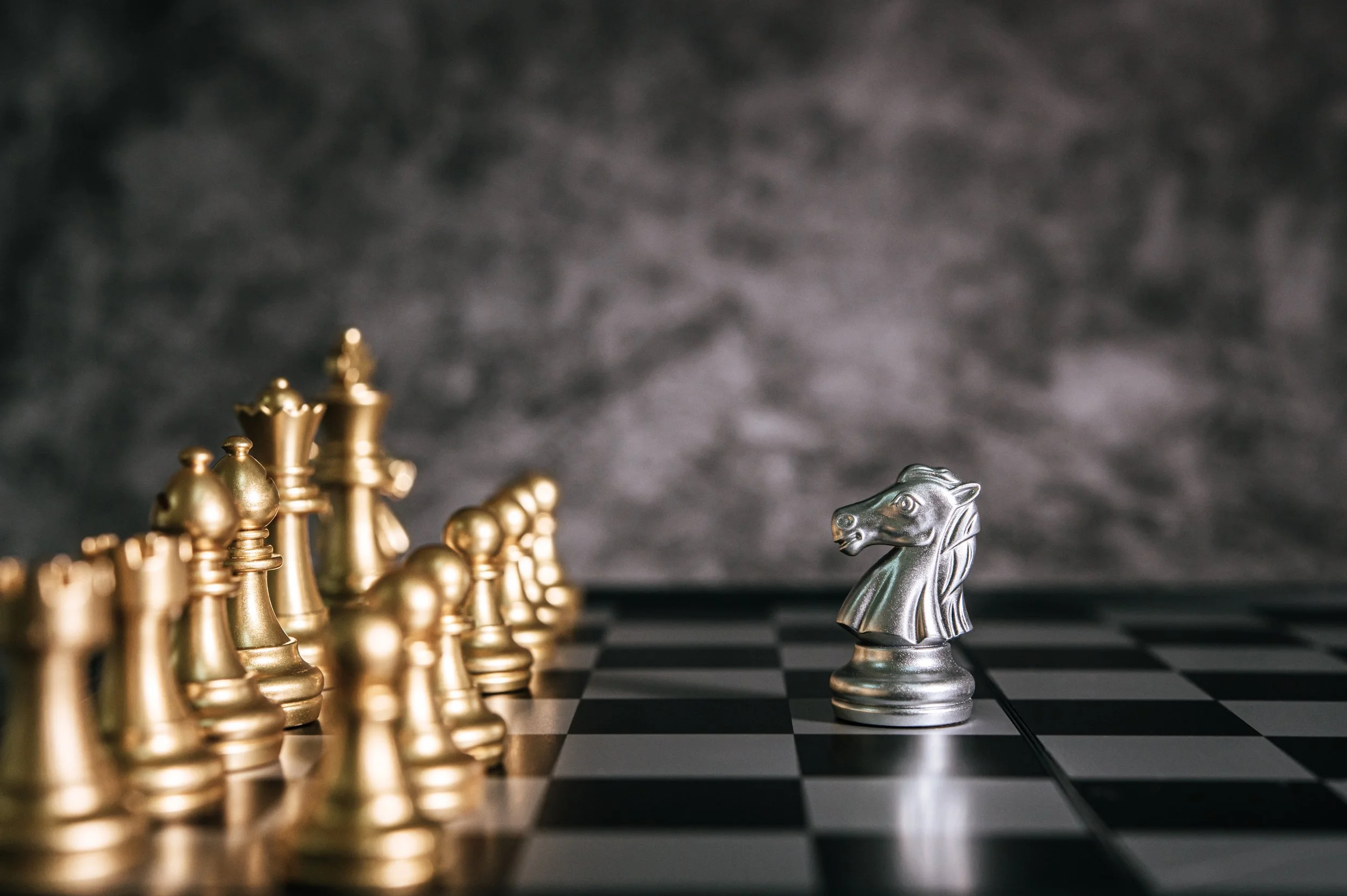 Gestaldt Executive Alignment depicted by chess pieces and board.