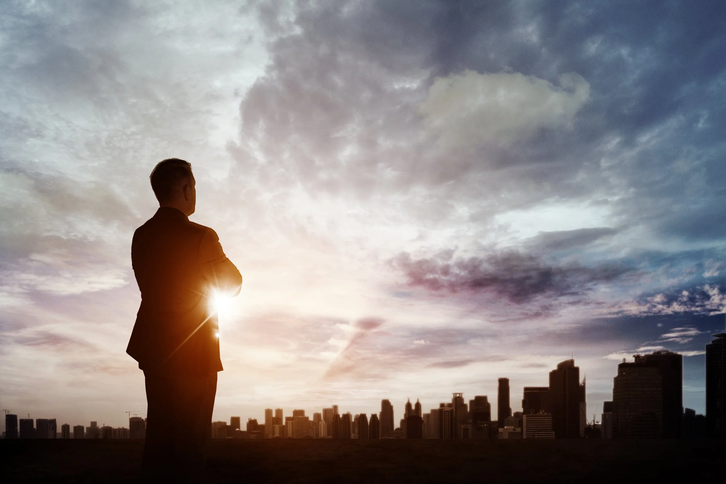Confident businessman looking at vision 2030 by Gestaldt