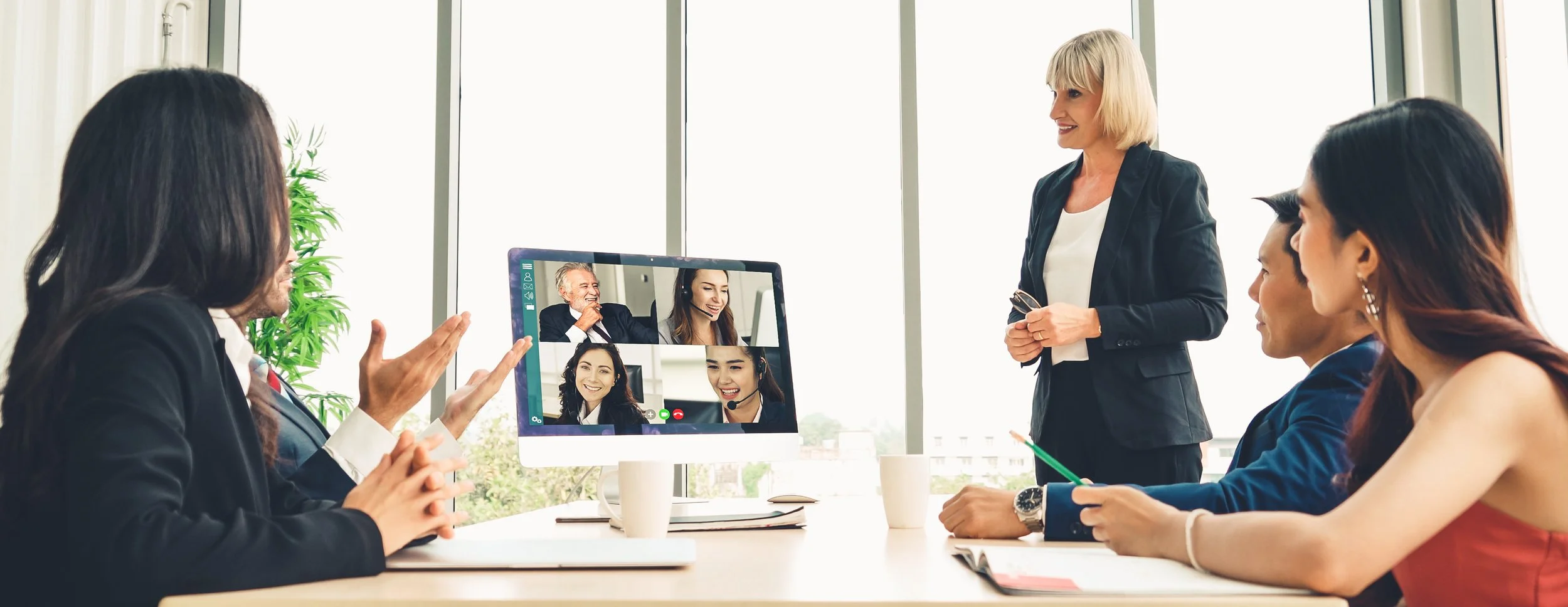Employees from diverse backgrounds collaborating across departments by Gestaldt