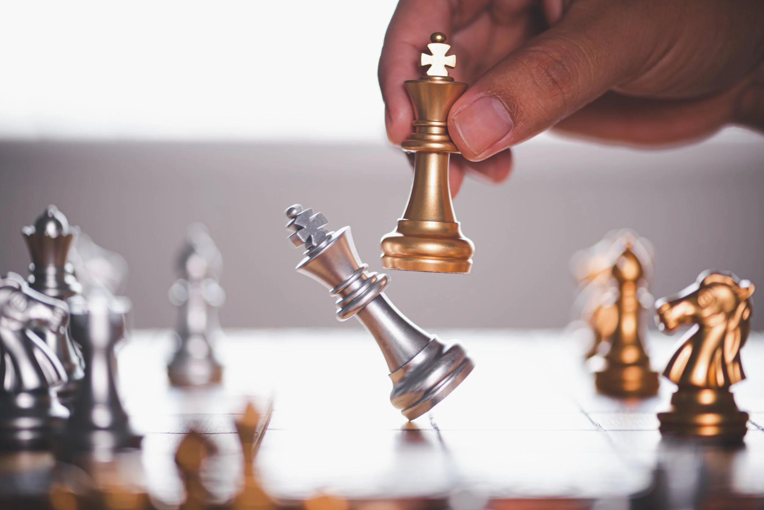 Gestaldt Strategy Execution depicted by chess pieces and board.