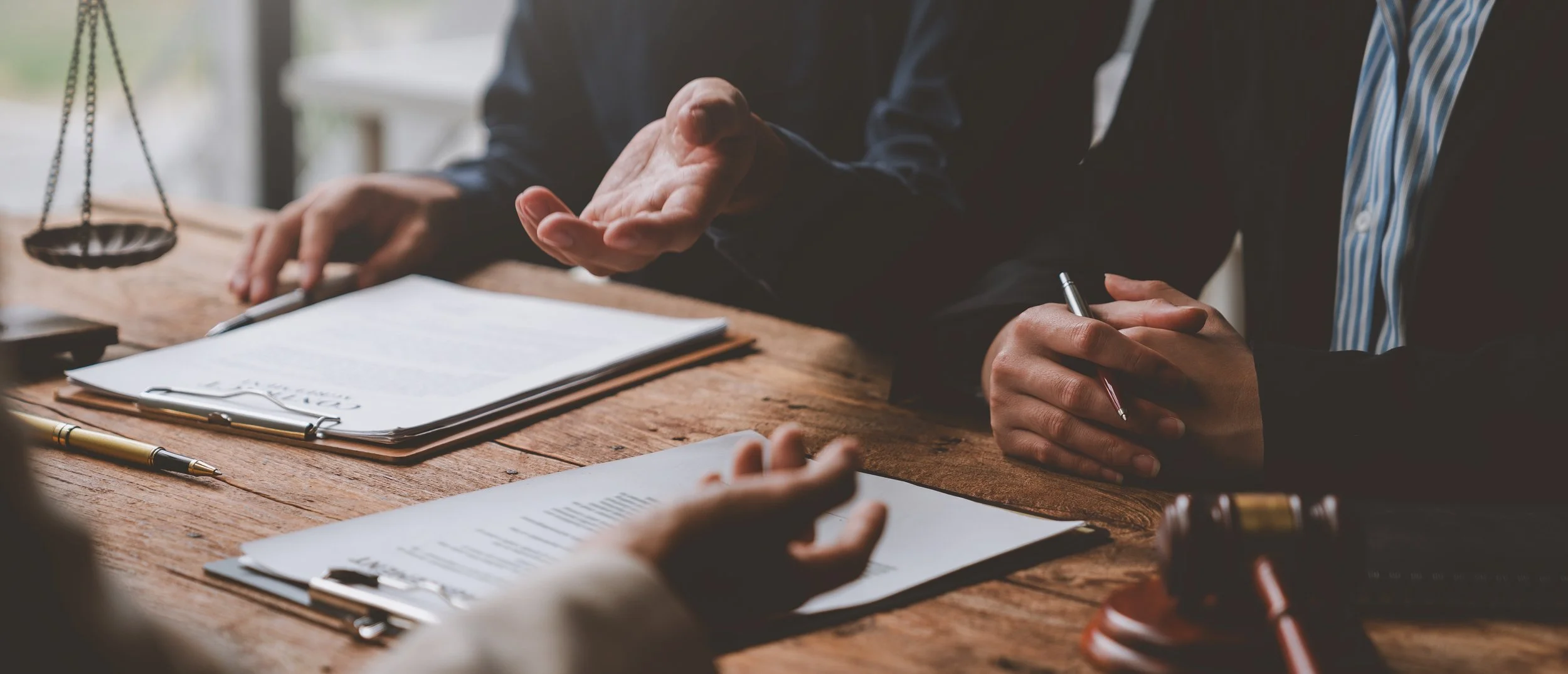 Lawyers, legal advisors, businessmen, investors brainstorm to clarify details of agreements, business contracts, joint financial investments in office real estate projects.